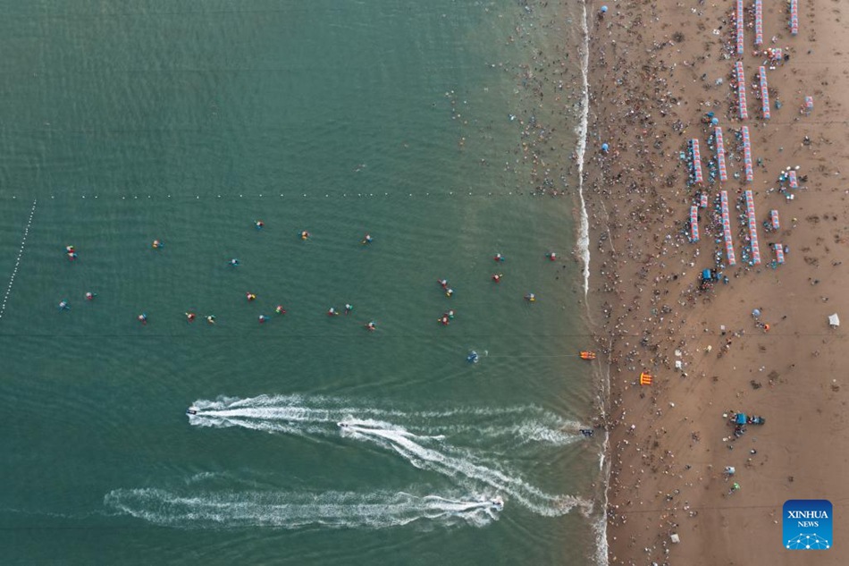 Zhoushan, Zhejiang: turismo estivo stimolato da vari intrattenimenti sul mare