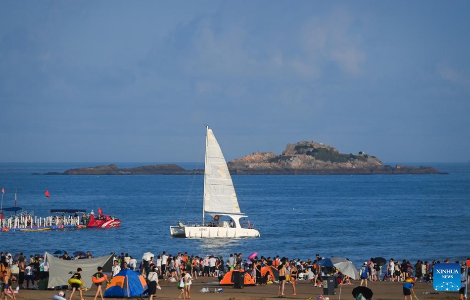 Zhoushan, Zhejiang: turismo estivo stimolato da vari intrattenimenti sul mare